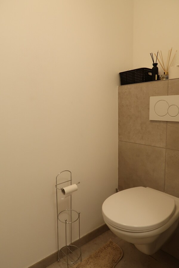 Nieuwbouwappartement in een groene zone met Garagebox 