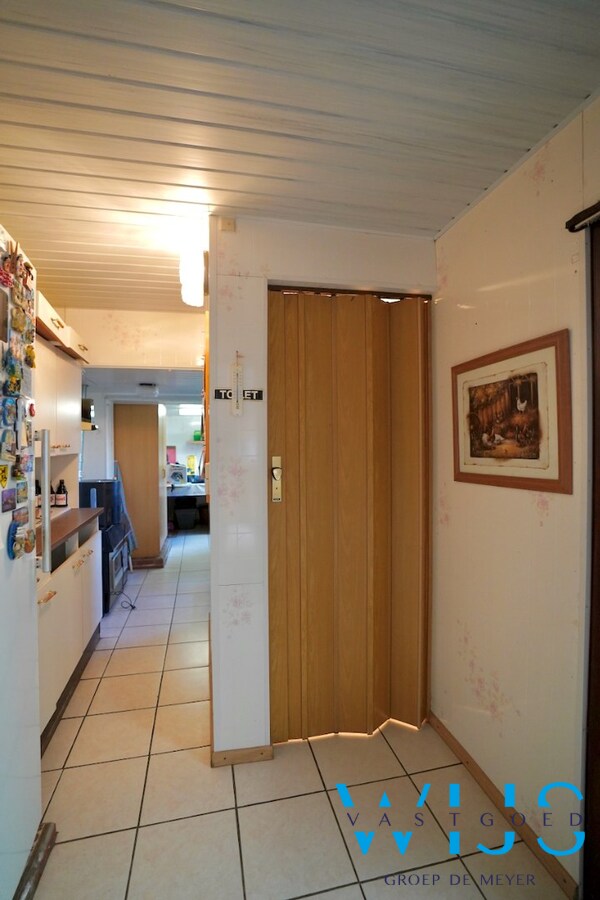 Interessante te renoveren woning met 4 slaapkamers in het centrum van Destelbergen 