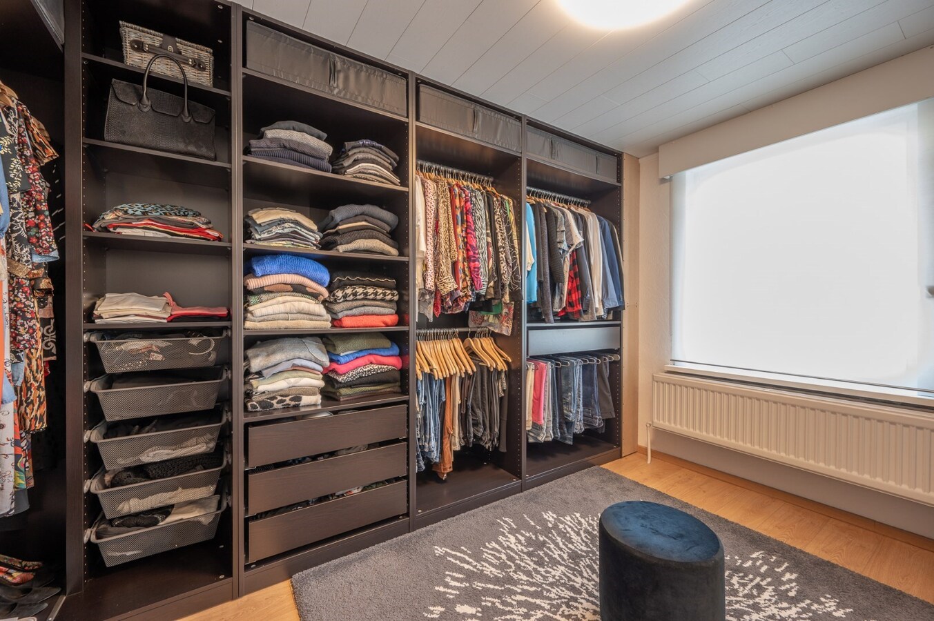 Rustig gelegen halfopen bebouwing met tuin en twee garages te Heist 