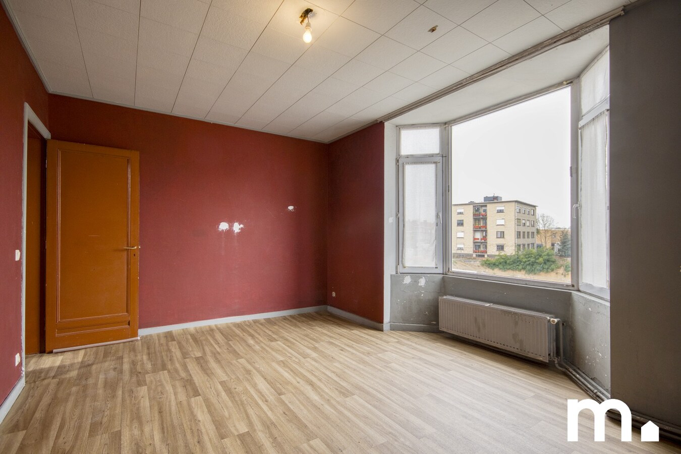 Woning met 3 slaapkamers, tuin en uitstekende verbinding te Kortrijk ! 