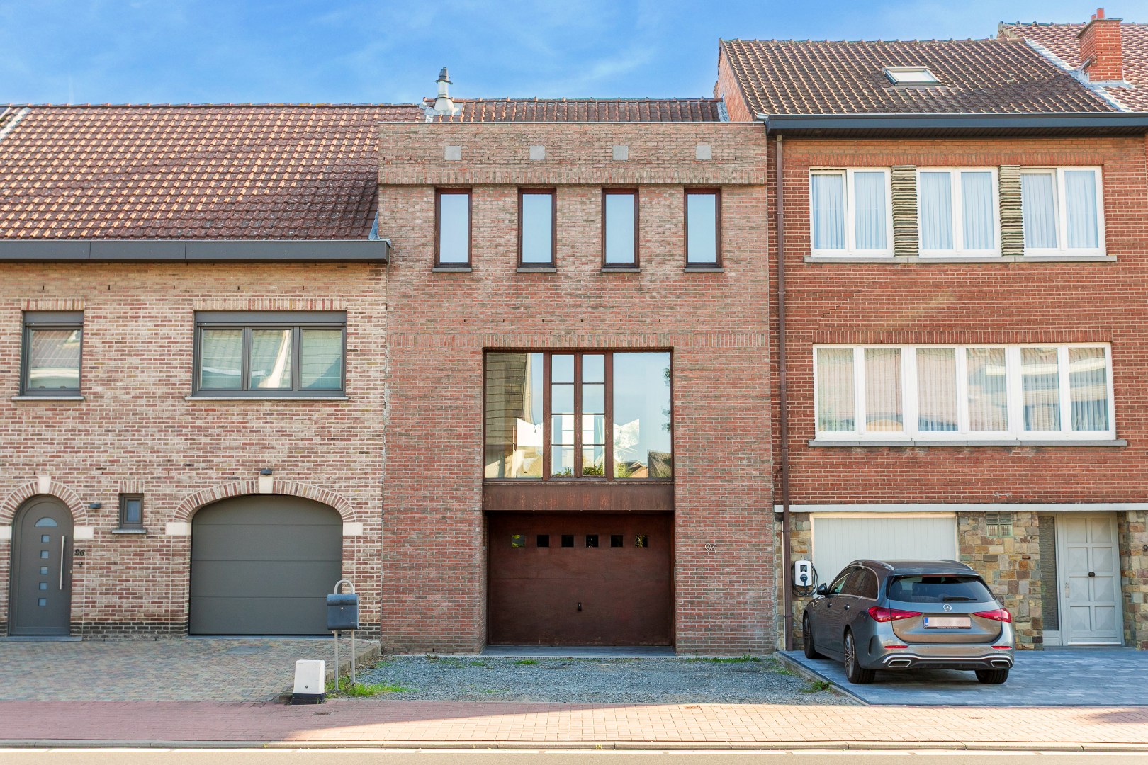 Karaktervolle architectenwoning (EPC B) met 3 slpks, garage en tuin te Lot 