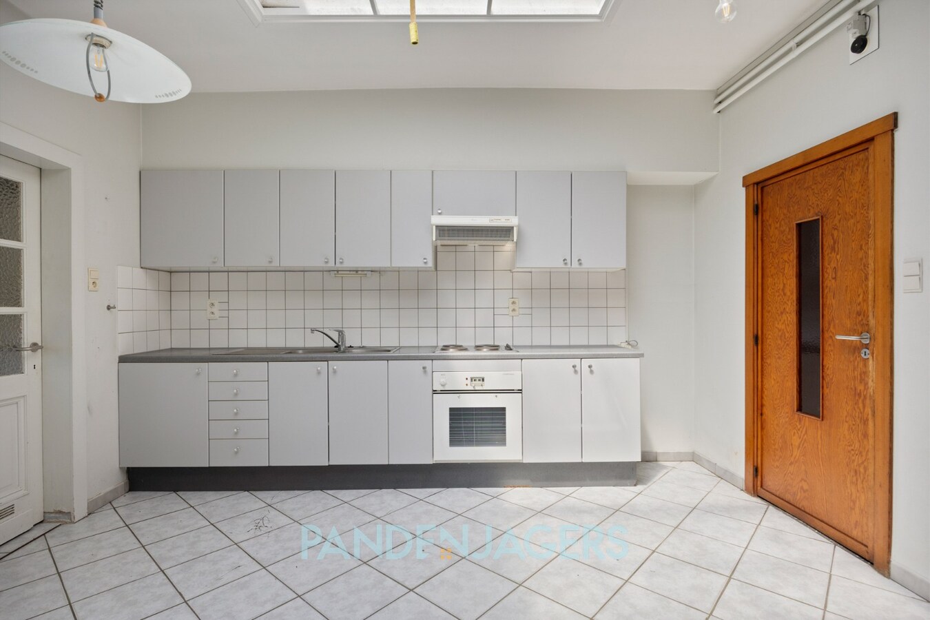 Rijwoning met diepe tuin en extra ingang voor de tuin te Duffel 