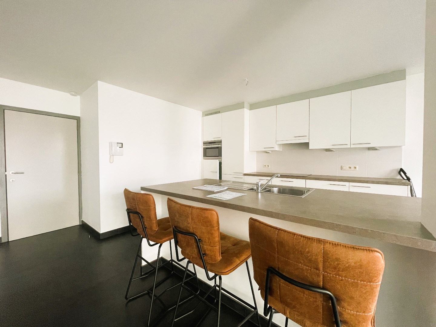 Gelijkvloers appartement met 2 slaapkamers en aangename tuin 