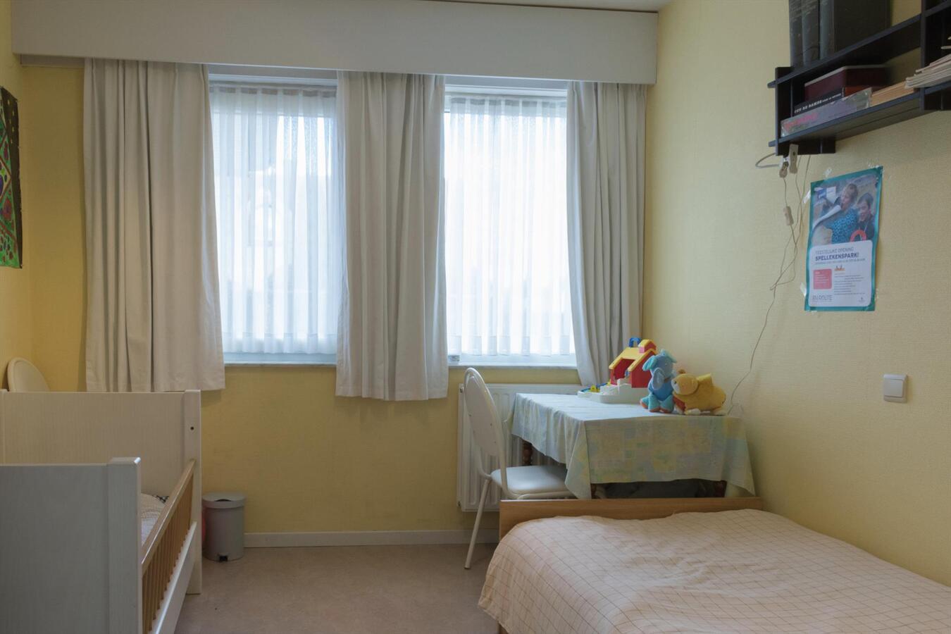 Gelijkvloers villa-appartement met zonnige tuin op toplocatie 