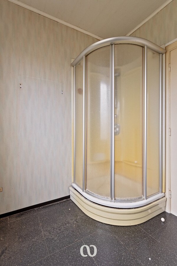 Te renoveren gezinswoning met mooie tuin in Oudenaarde 