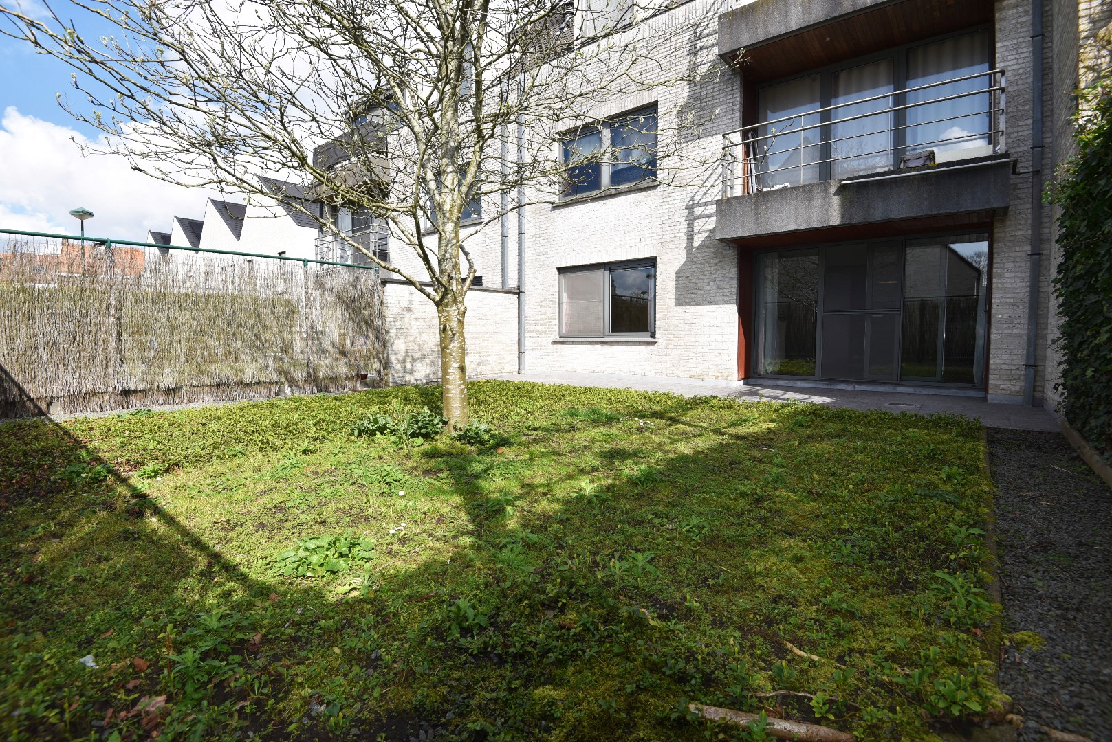 Gelijkvloers appartement met tuin en garage te Kaprijke 