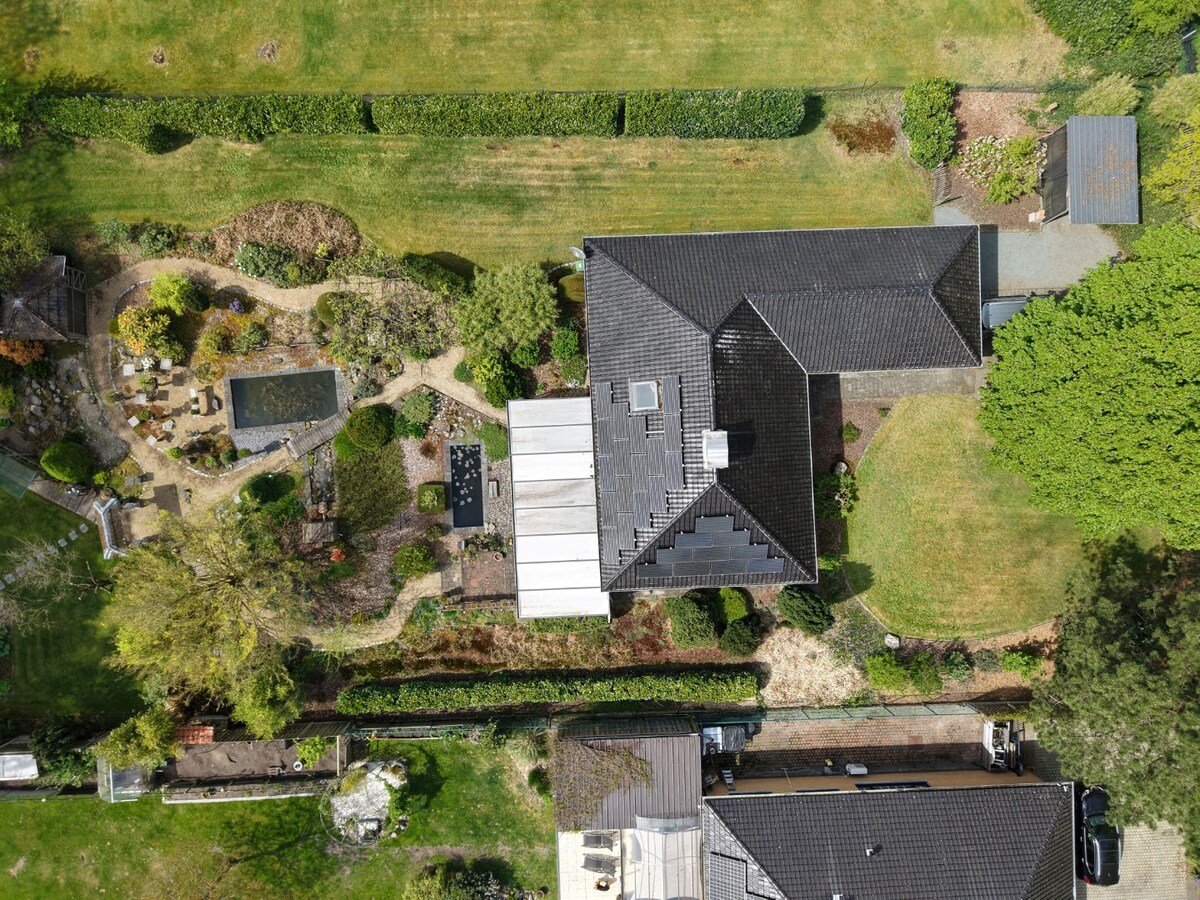 Rustig wonen in het groen –  gelijkvloerse woning op riant perceel van 2178 m² 