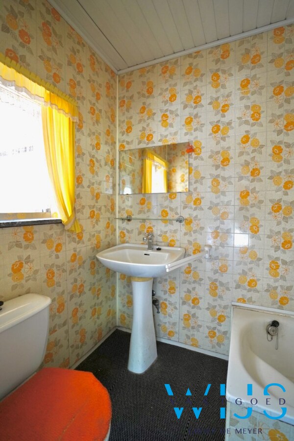 Te renoveren woonhuis met landelijke ligging te Assenede ! 