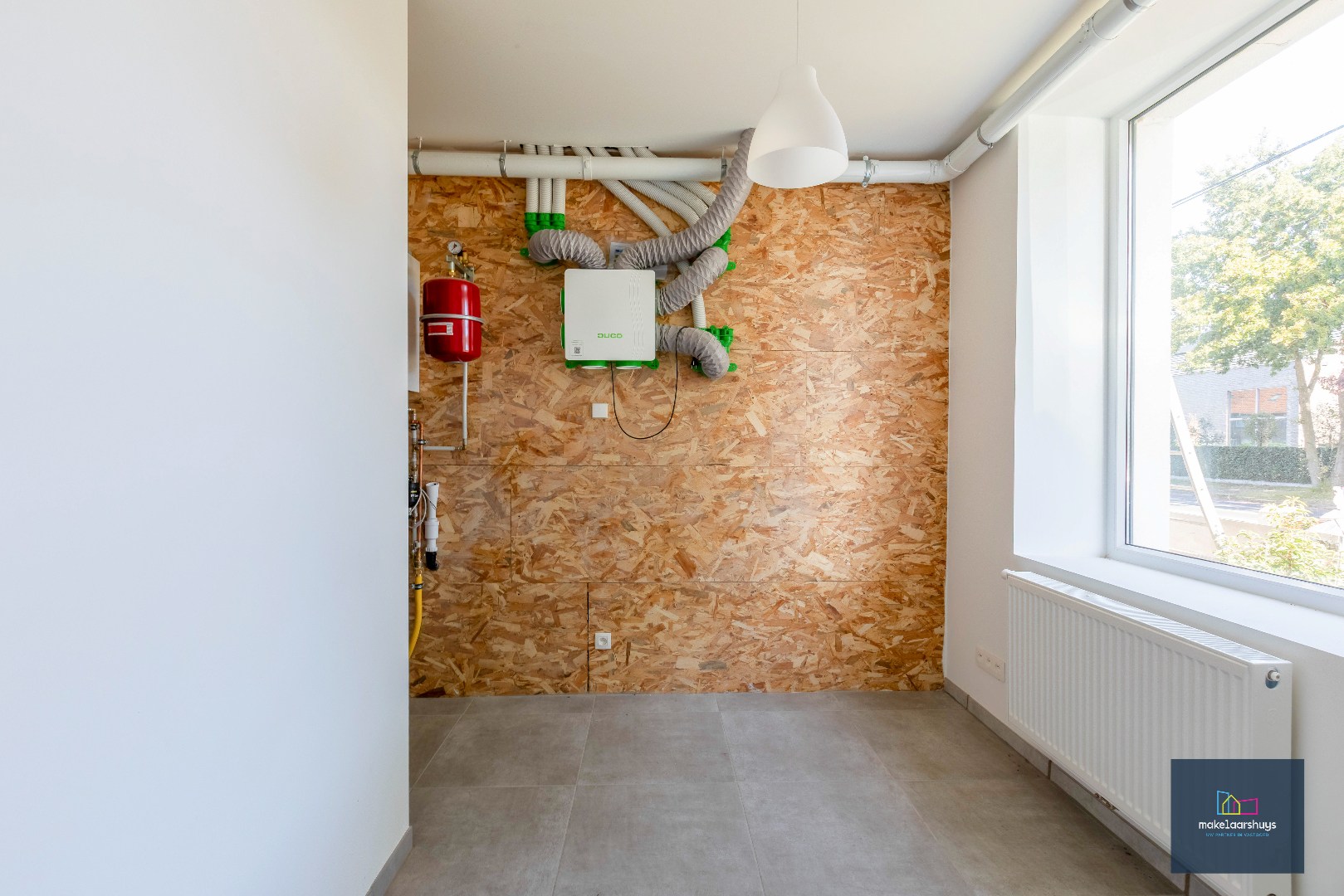 Instapklare energiezuinige woning met 3slpk tuin en staanplaats 