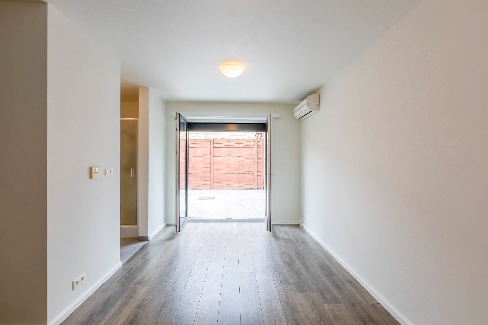 Gelijkvloers 1-slpk-app. met 2 terrassen op toplocatie in Eeklo 