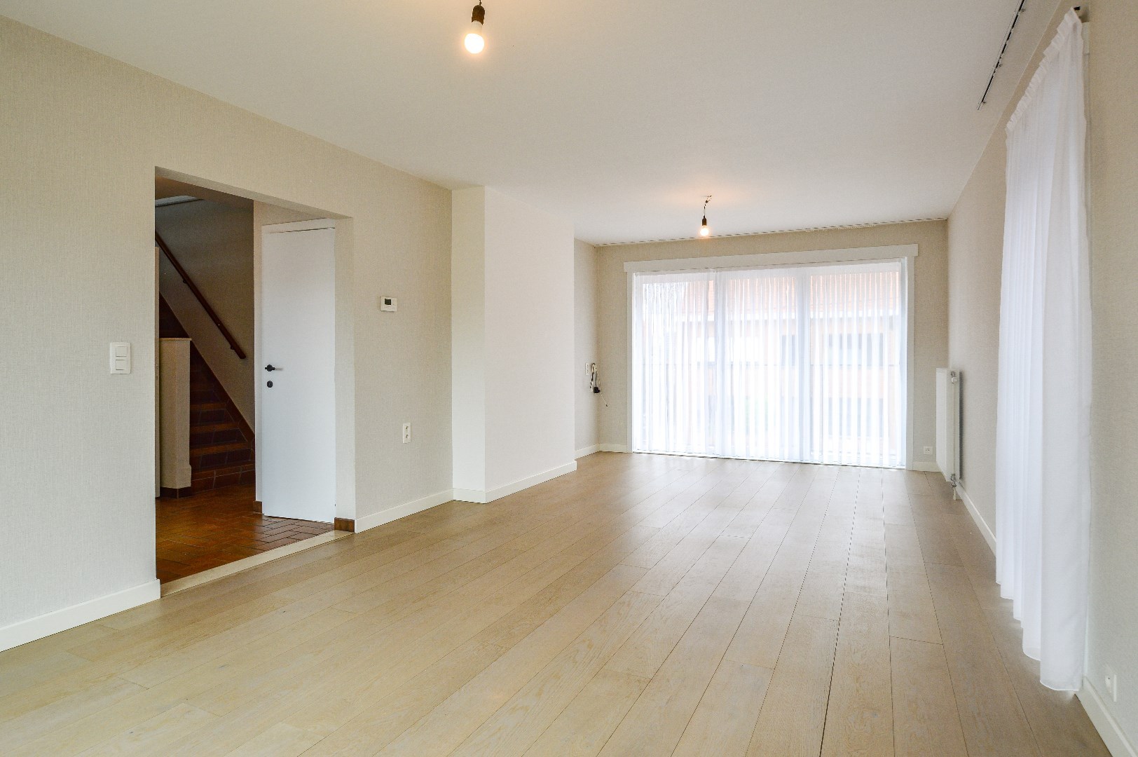 Duplex appartement met 2 slpks en 2 garages in centrum Eernegem 