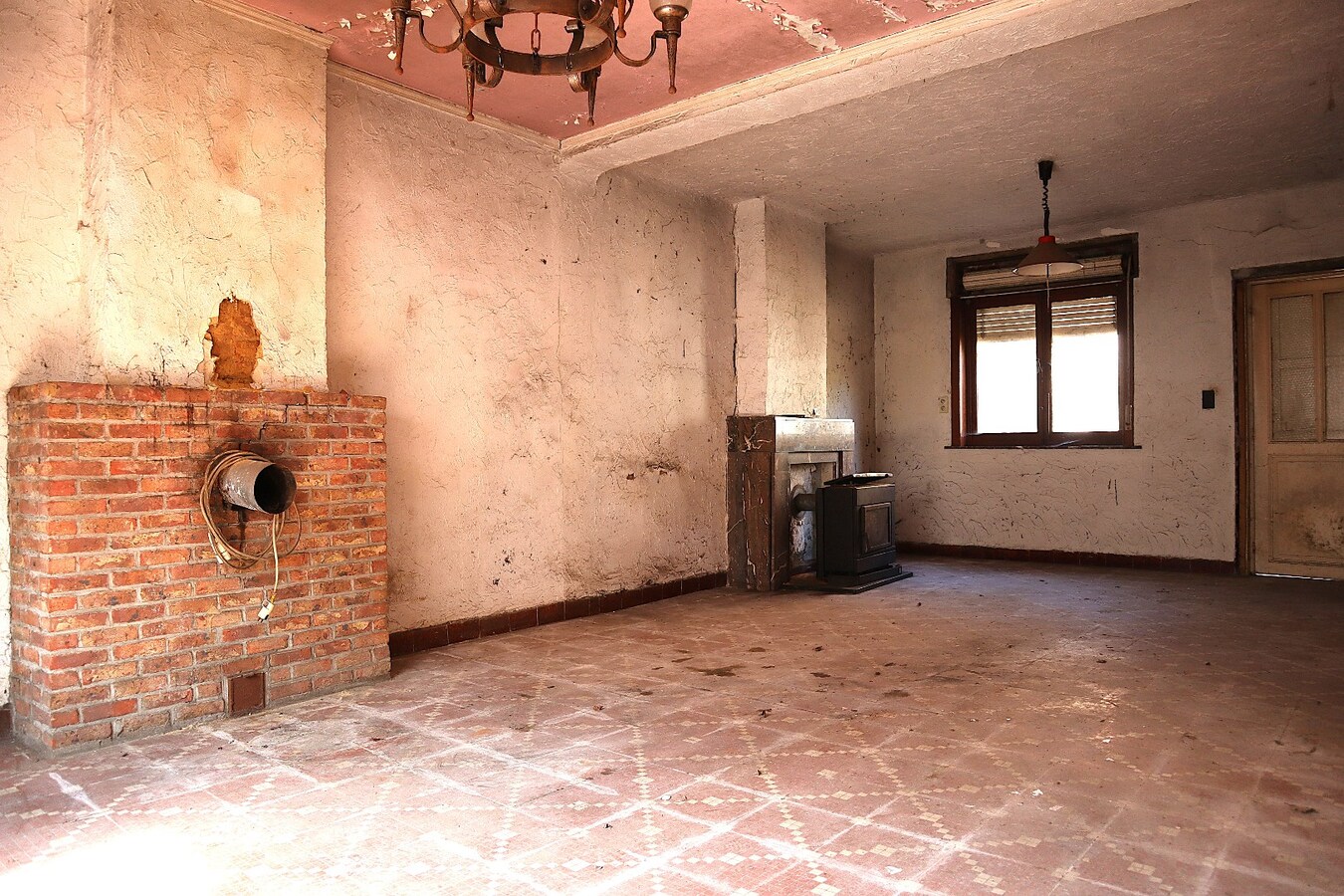 Te renoveren woning met magazijn/loods te Kessel-lo 