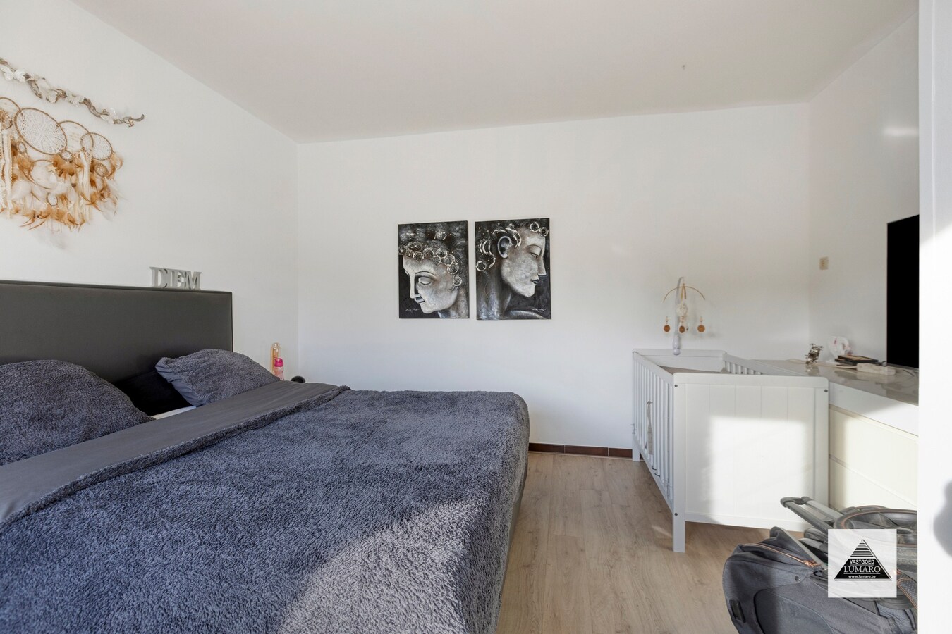 Gelijkvloers appartement met tuintje en parking 