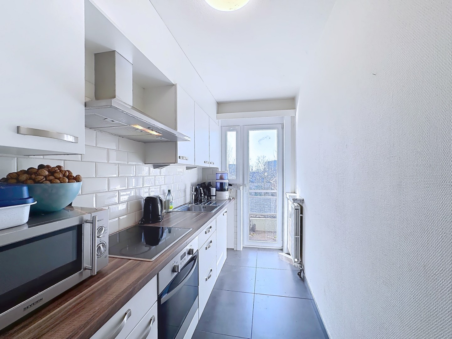 Appartement met slaaphoek en zonnig terras gelegen aan de Coupure 