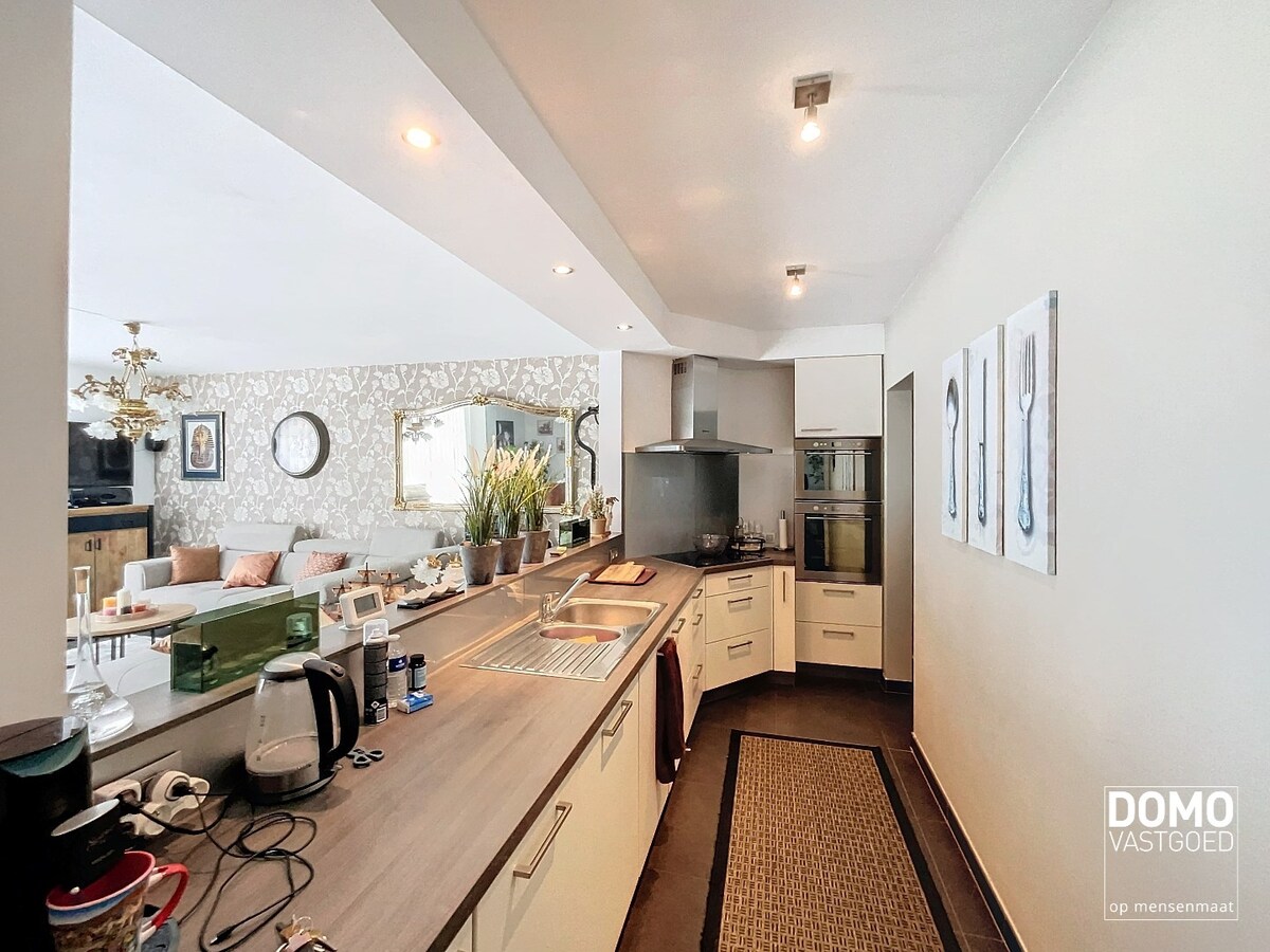 Gelijkvloers appartement met tuin en ondergrondse garage te Kermt - energielabel B -121m² bewoonbare oppervlakte 