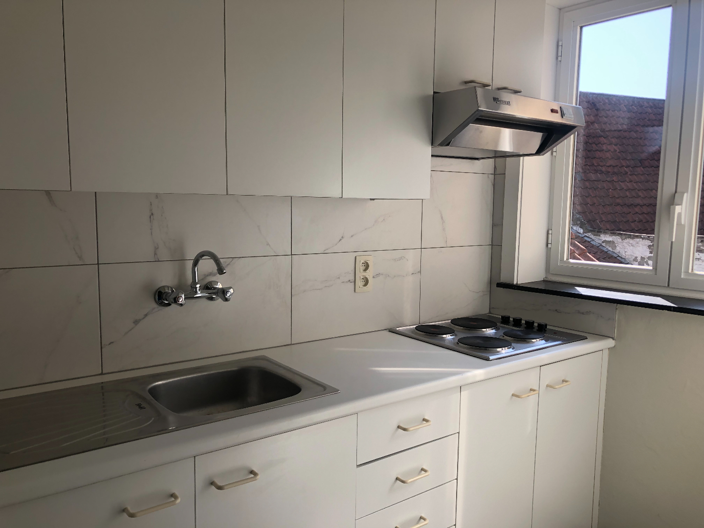 Centraal gelegen 1-slaapkamerappartement met garage 