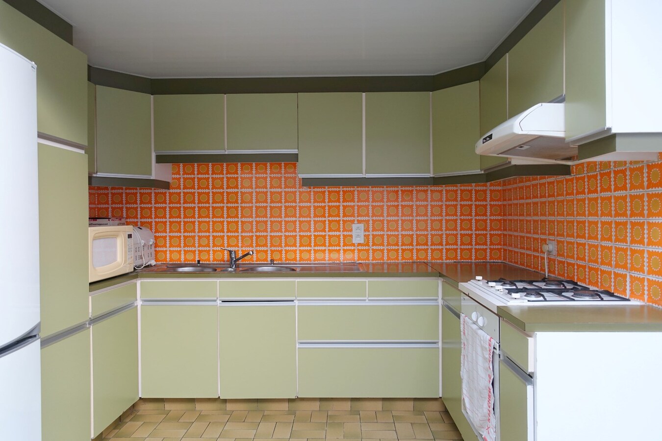 Rustig gelegen instapklare rijwoning met nabij gelegen garagebox 