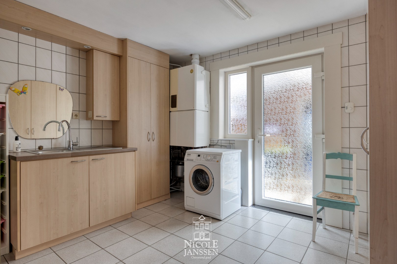 Wasplaats met voldoende kastruimte 