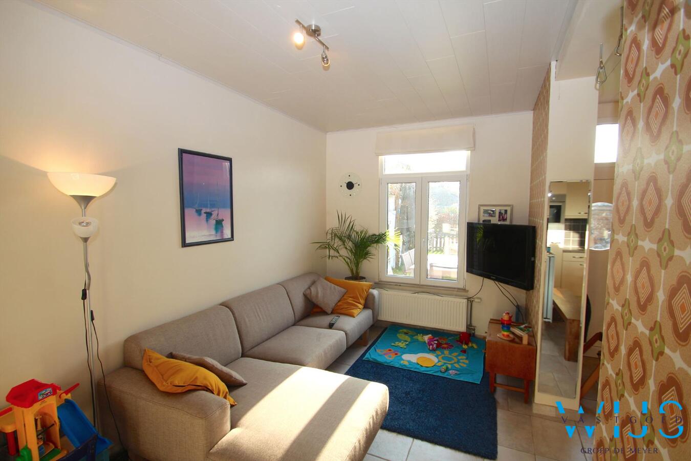 Knusse, instapklare starterswoning te Drongen ! 