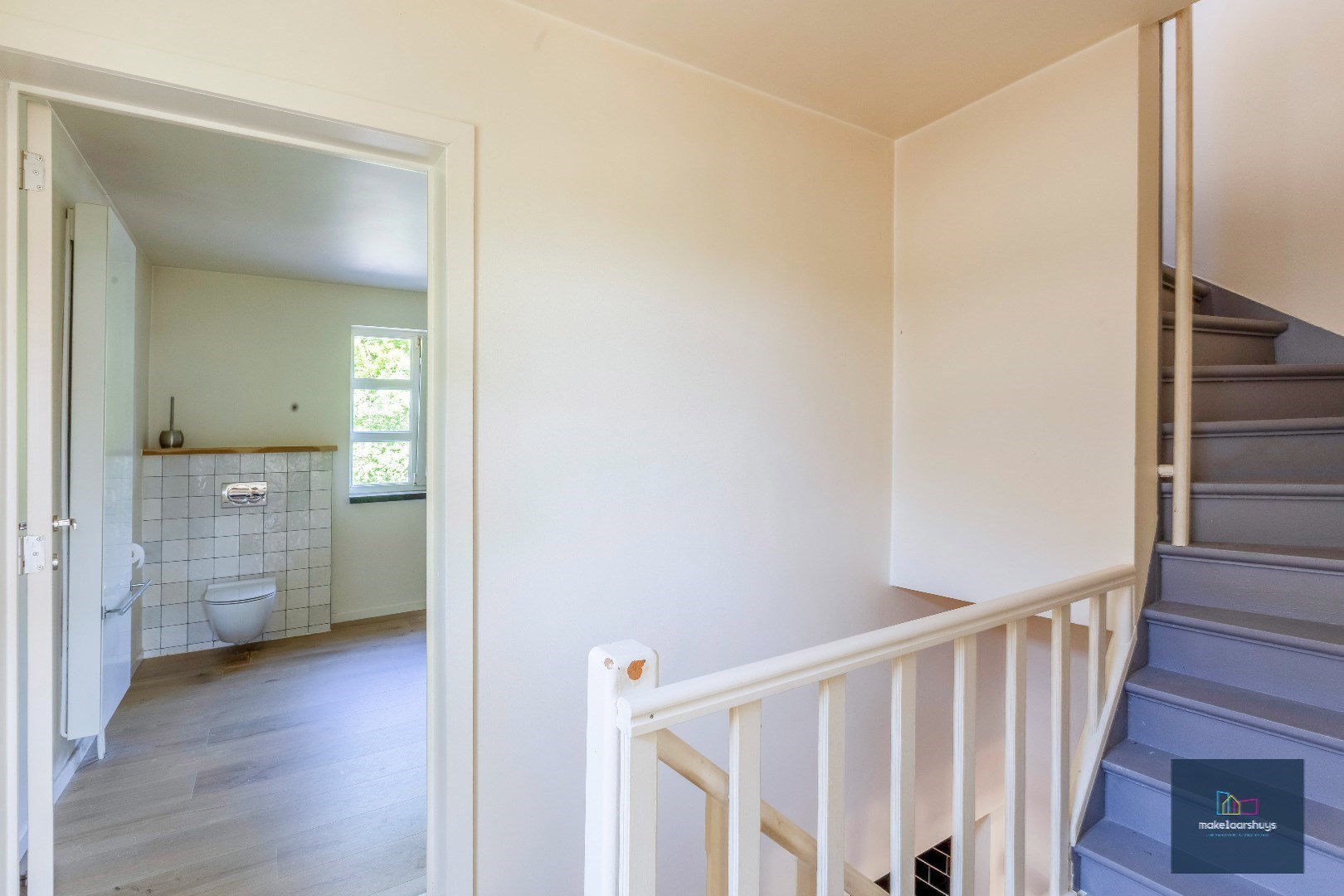 Halfopen bebouwing met zuidertuin en parkeergelegenheid nabij centrum Destelbergen 