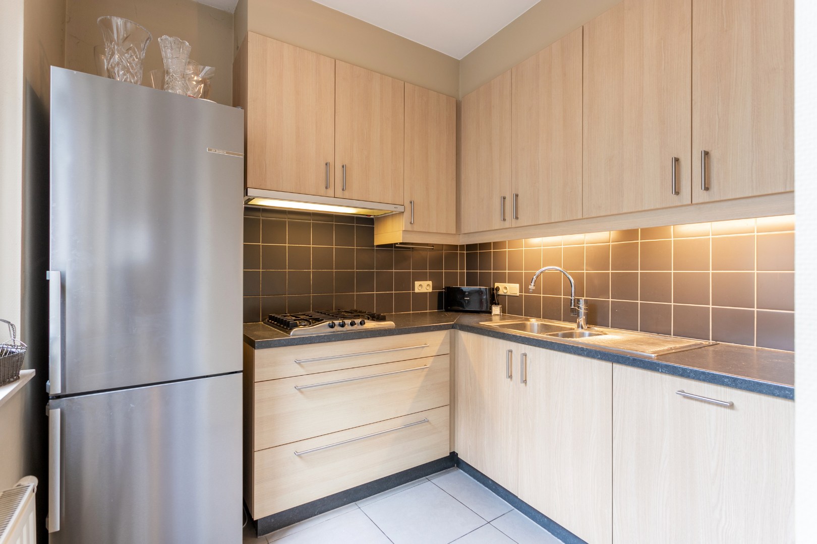 Handelspand met woonst te Halle centrum 