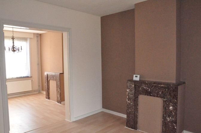 Gezellige, degelijke woning met aangename tuin. 