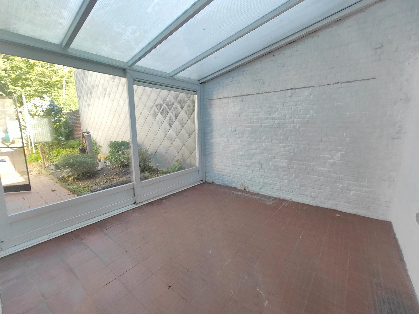 Unieke woning met achterliggende tuin  in het centrum van Pittem 