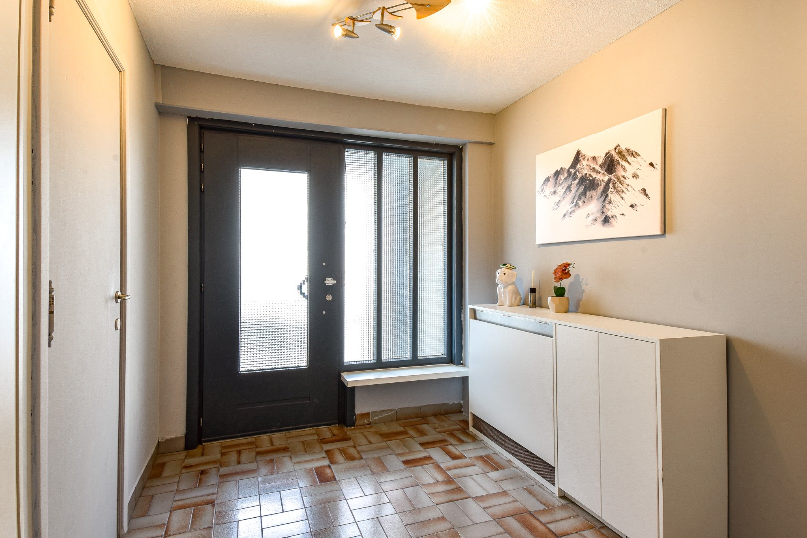 Ruime bel-étage woning met garage, tuin en mogelijkheid tot 4 slaapkamers 