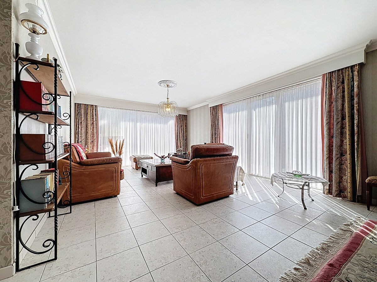 Energiezuinig gelijkvloersapp. met tuintje en garage te centrum Wetteren 