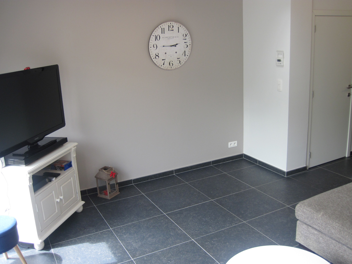 Recent vernieuwde rijwoning nabij de Schelde. 