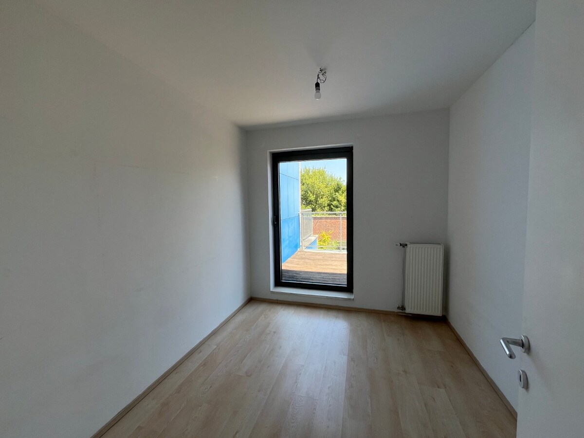 Centrumwoning met tuin, terras én ondergrondse parkeerplaats. 
