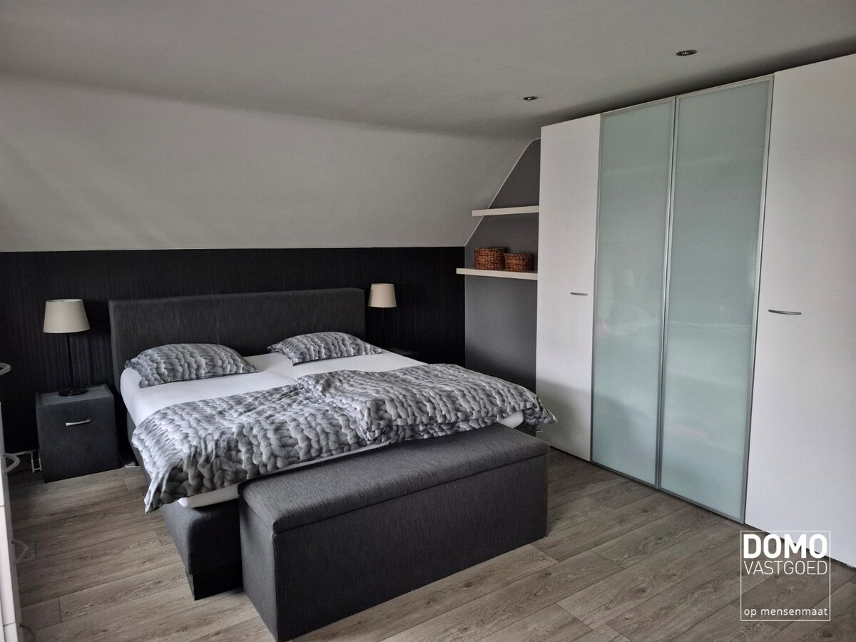 Warme gezinswoning met prachtige tuin in hartje Kortessem 