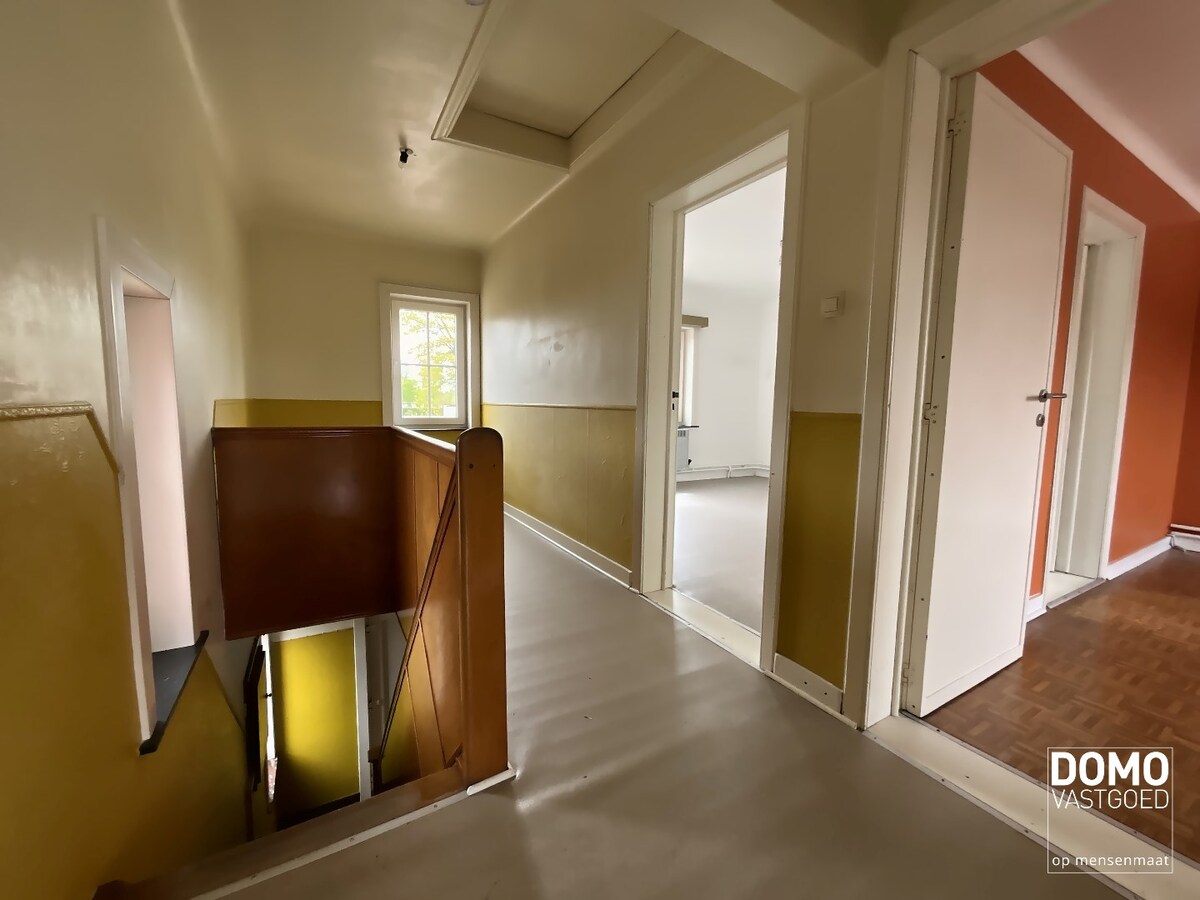 WONING MET TUIN, GARAGE EN 3 SLAAPKAMERS IN HET CENTRUM VAN KERMT 