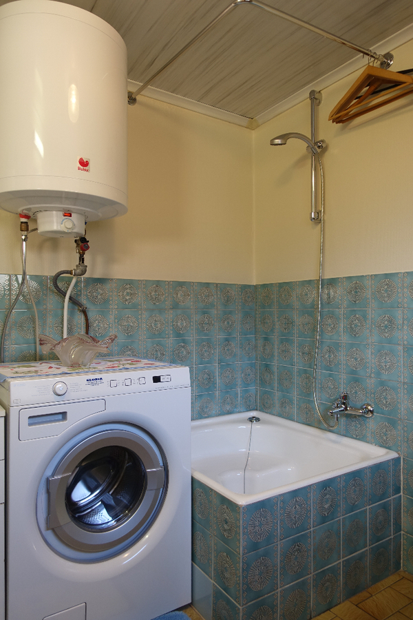 Half-open woning met 4 slaapkamers op unieke ligging 