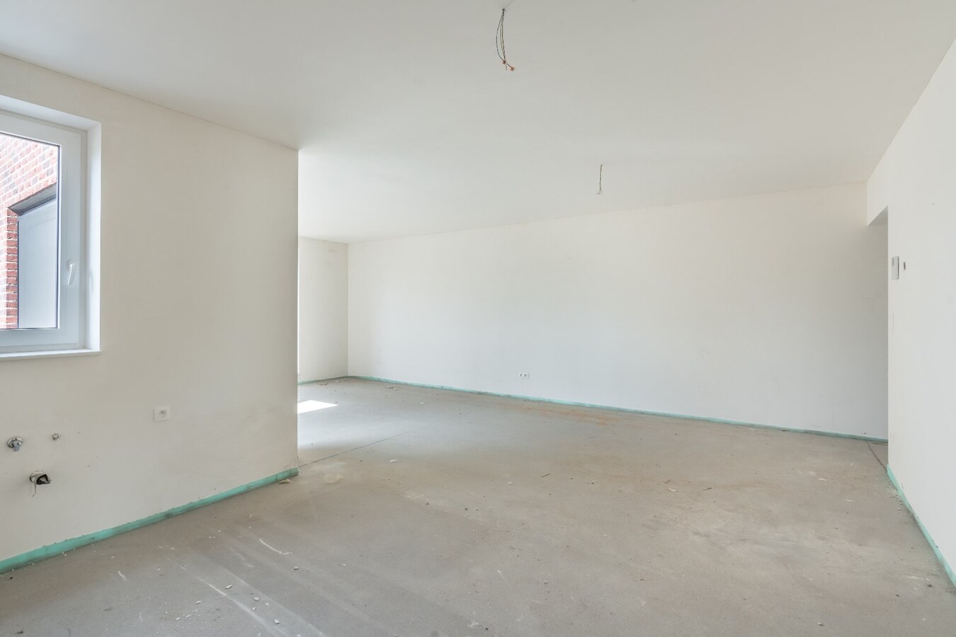 Appartement met twee slaapkamers, ruim terras en garage. 