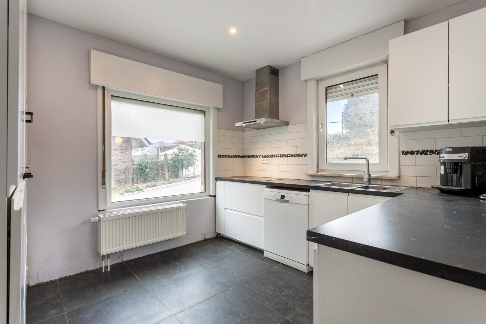 Solide woning met 3 slpks, tuin en garage te Buizingen 