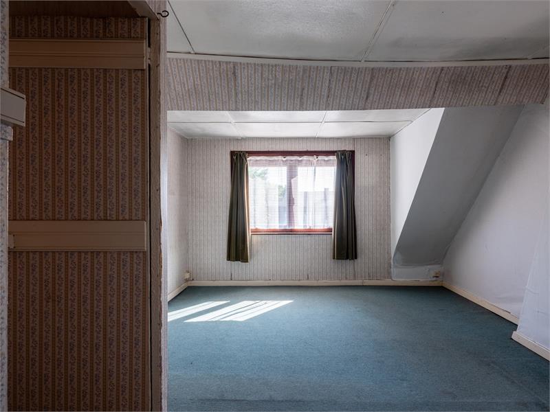 Charmante halfopen woning te Watervliet met potentieel. 