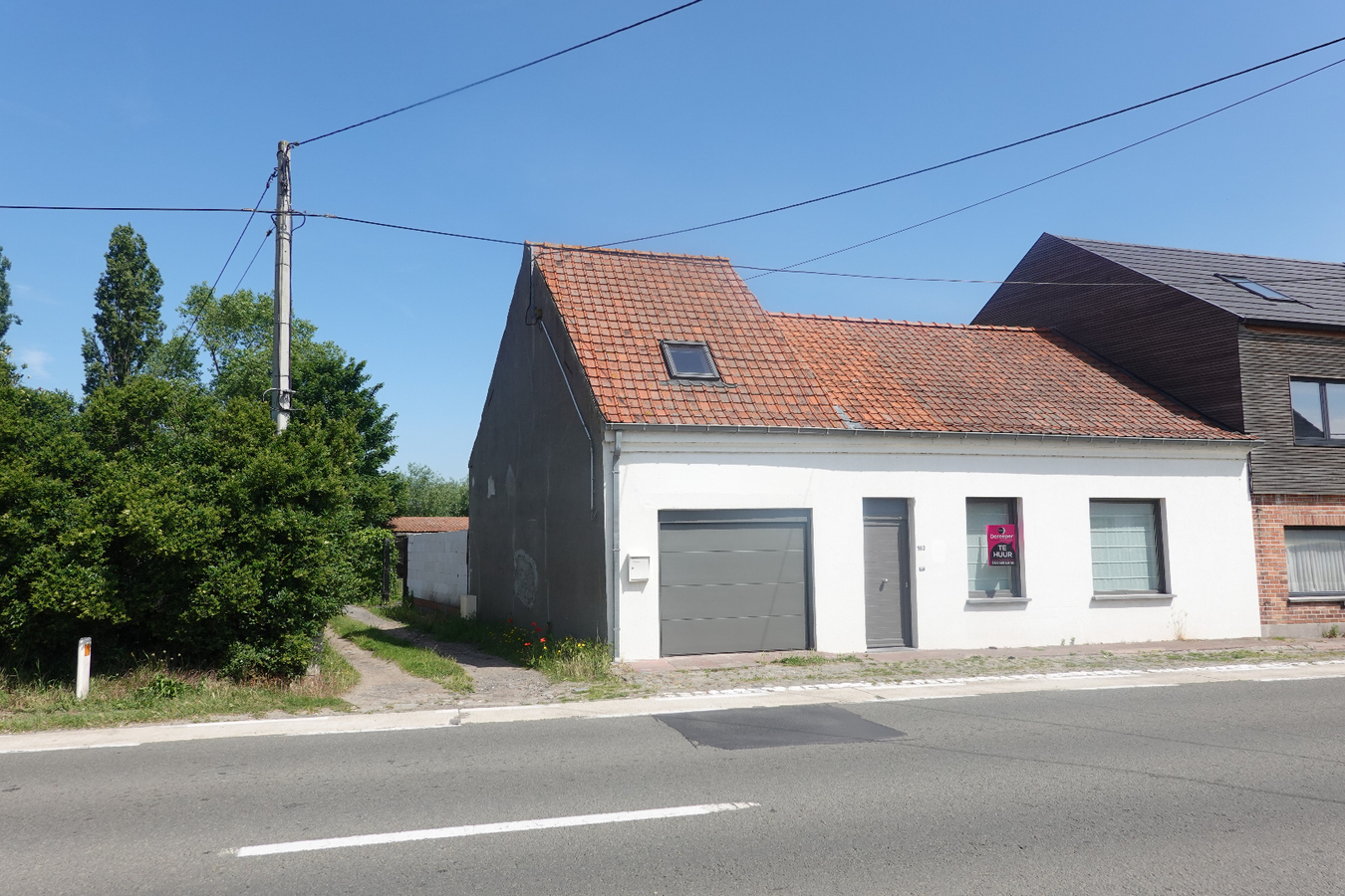 Knusse woning met grote tuin 