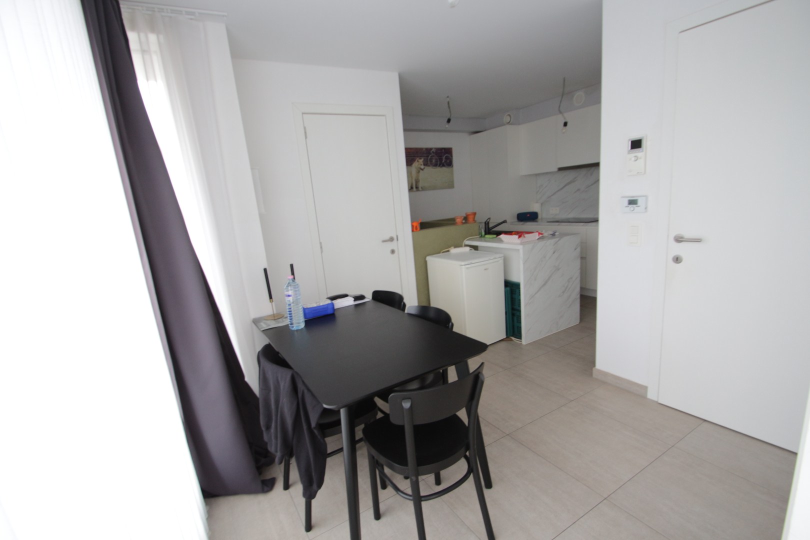 Centraal gelegen dakappartement met één slaapkamer en garage 