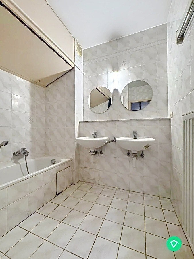 Appartement met 2 slaapkamers en autostandplaats in centrum Leuven 