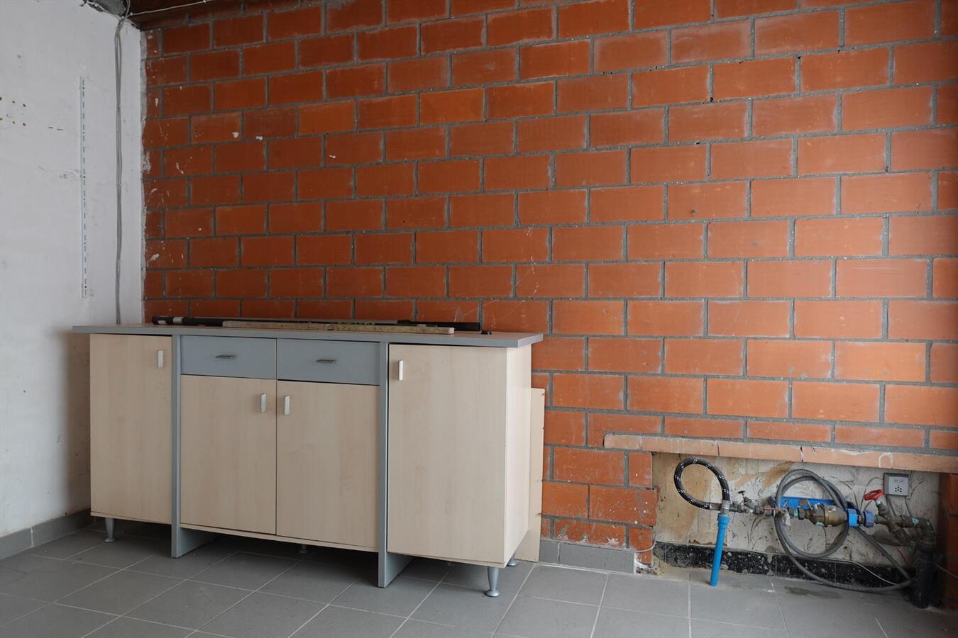 Rijwoning met tuin in centrum Eernegem 