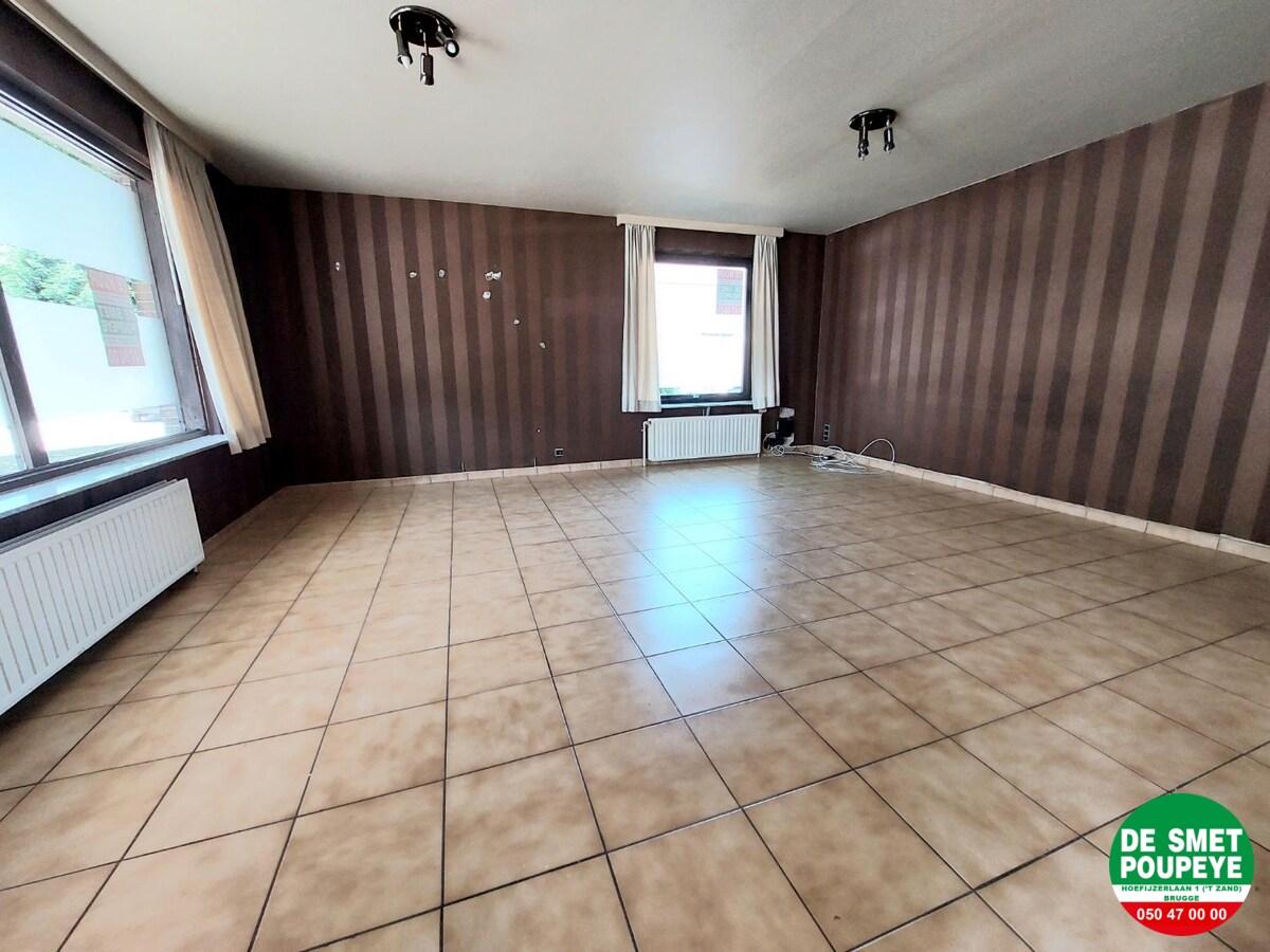 GELIJKVLOERSAPPARTEMENT MET TUINTJE 