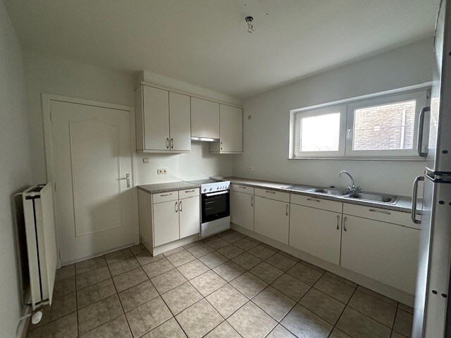 Een nette, comfortabele  gezinswoning met 3 slaapkamers, garage en tuin. 