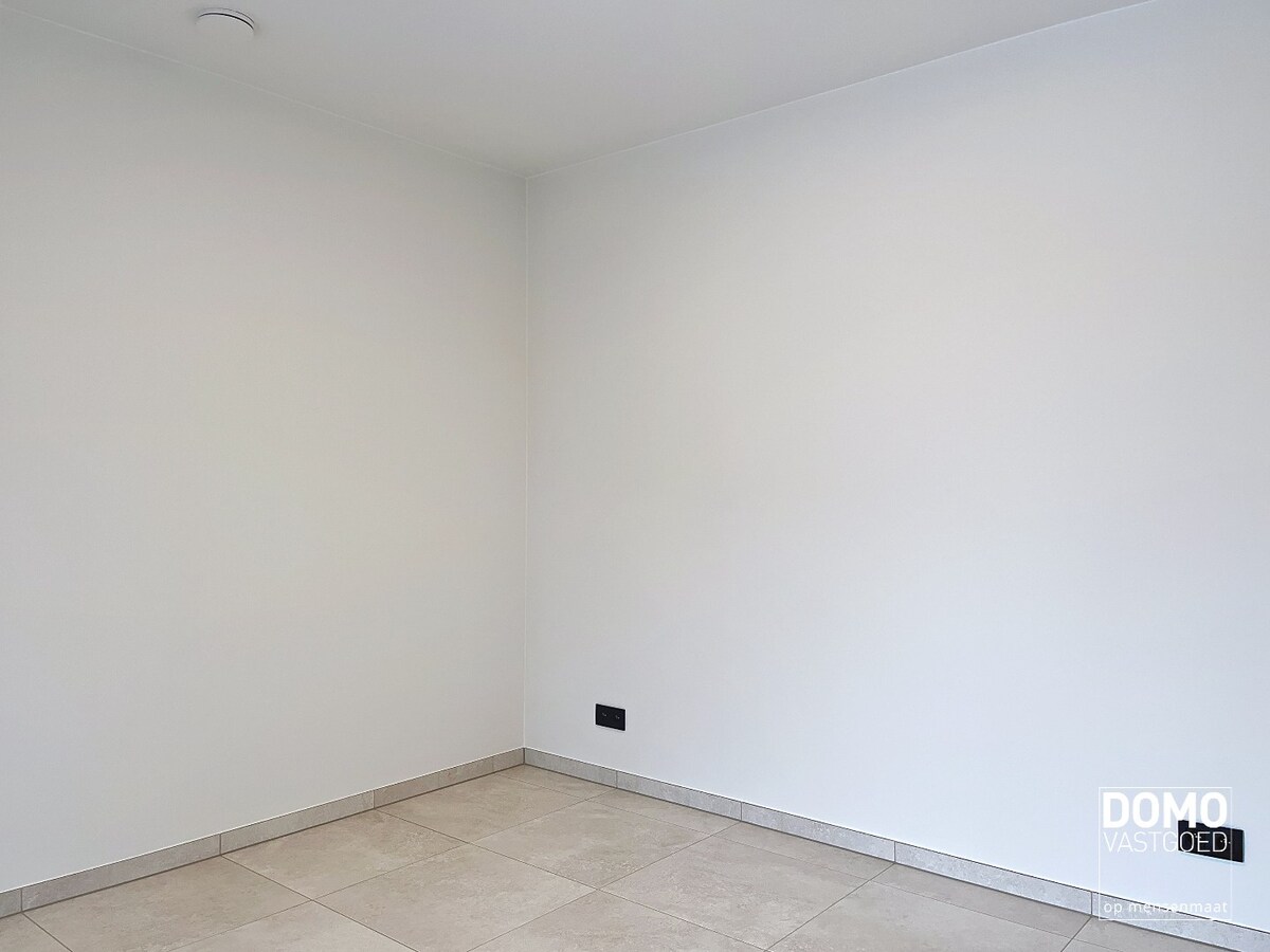 Modern gelijkvloers appartement gelegen te Kermt - 2 slaapkamers - energiezuinig - ruim terras 