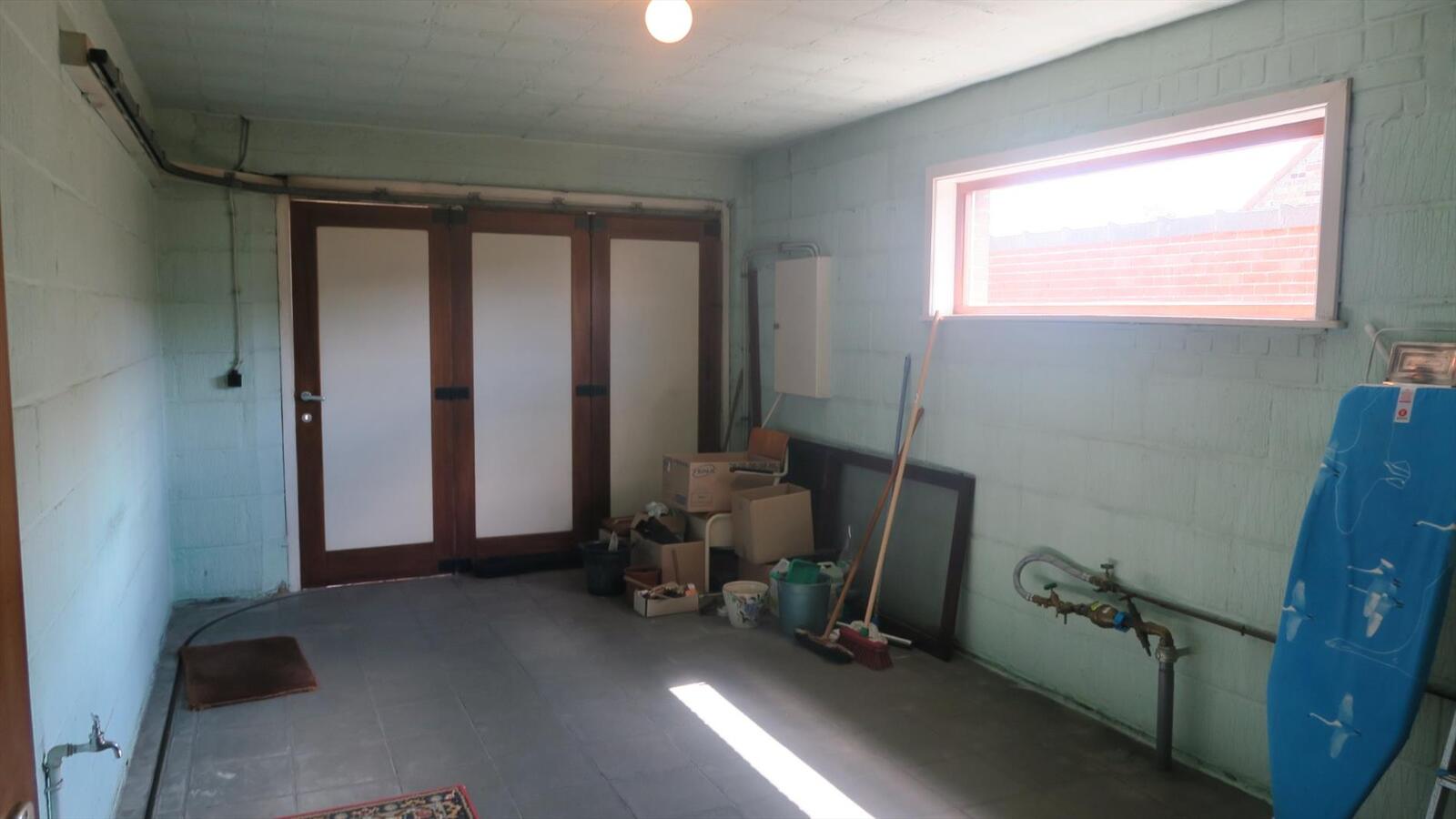Degelijke open woning op ruim perceel van 843m² 