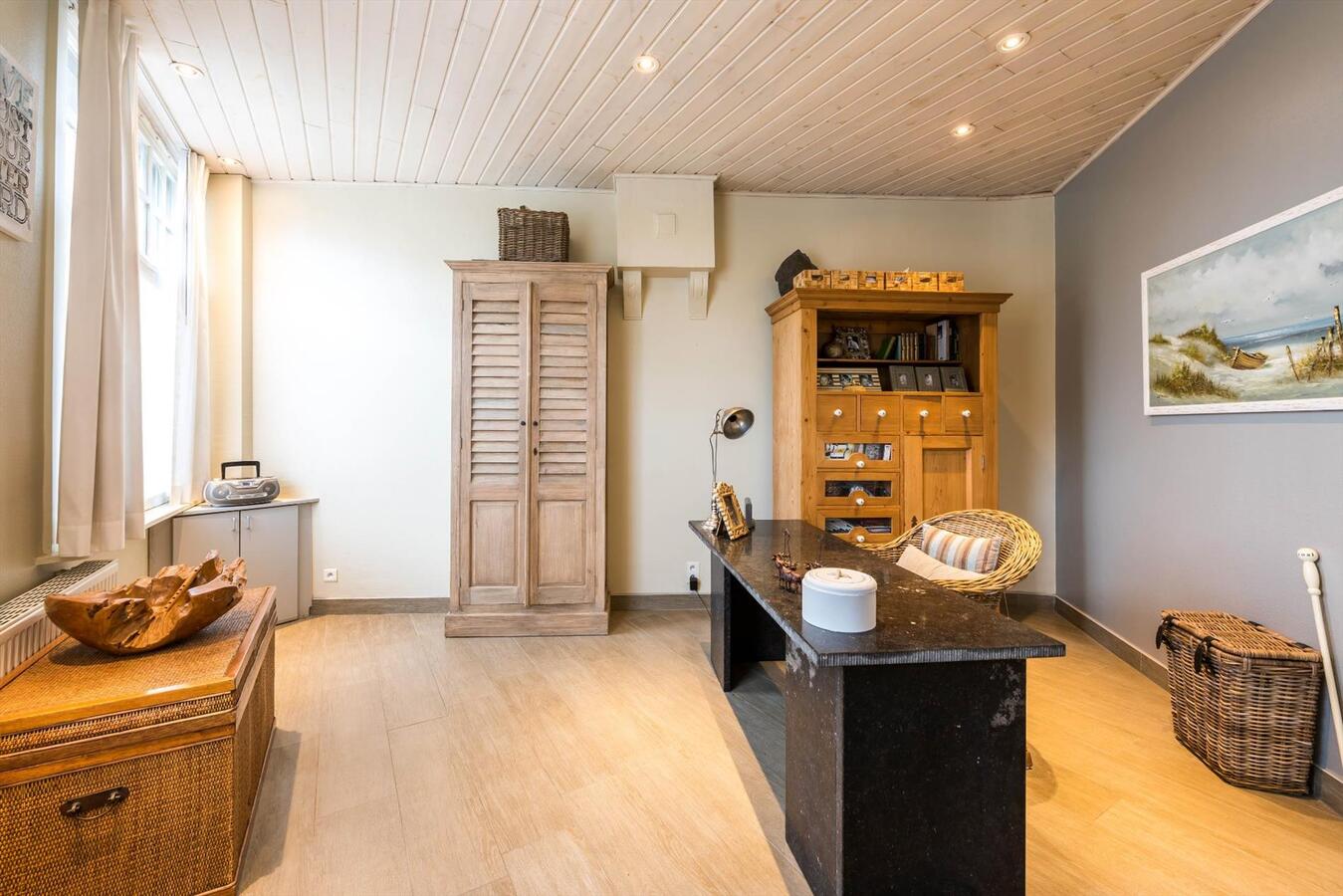 Klassevolle herenwoning met praktijkruimte 