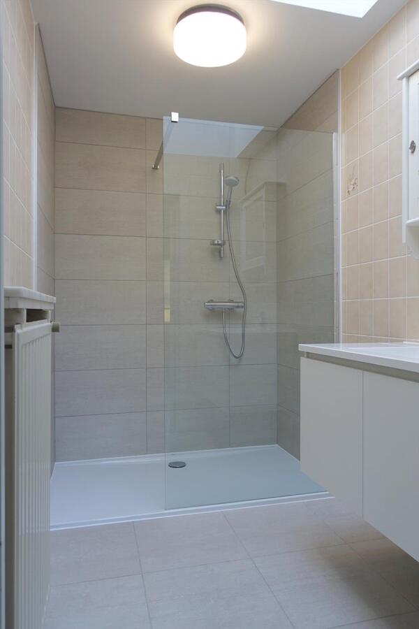 Gezellige half-open woning met zonnige tuin 