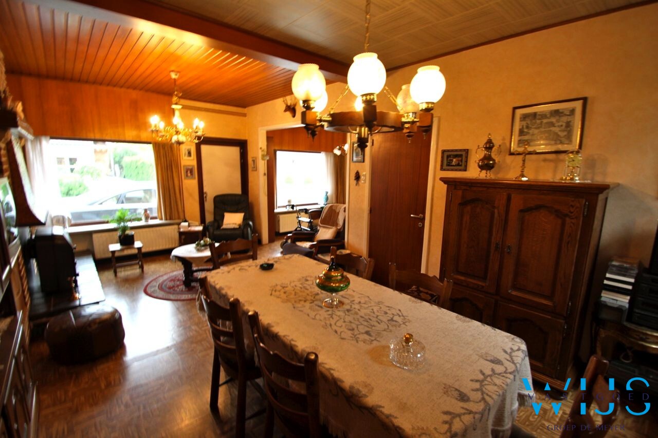 Centraal gelegen woning met mooie grond te Ertvelde! 