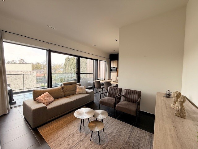 Nieuwbouwappartement met 1 slaapkamer, terras en autostandplaats te Maasmechelen. 