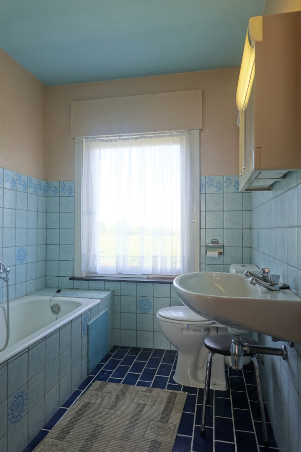 Alleenstaande woning met garage en mooie tuin 